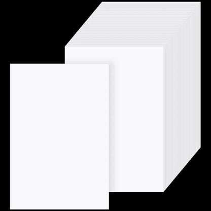 Stapel witte afdekstickers in A6-formaat voor diamond painting projecten, met een vel apart getoond op de voorgrond.